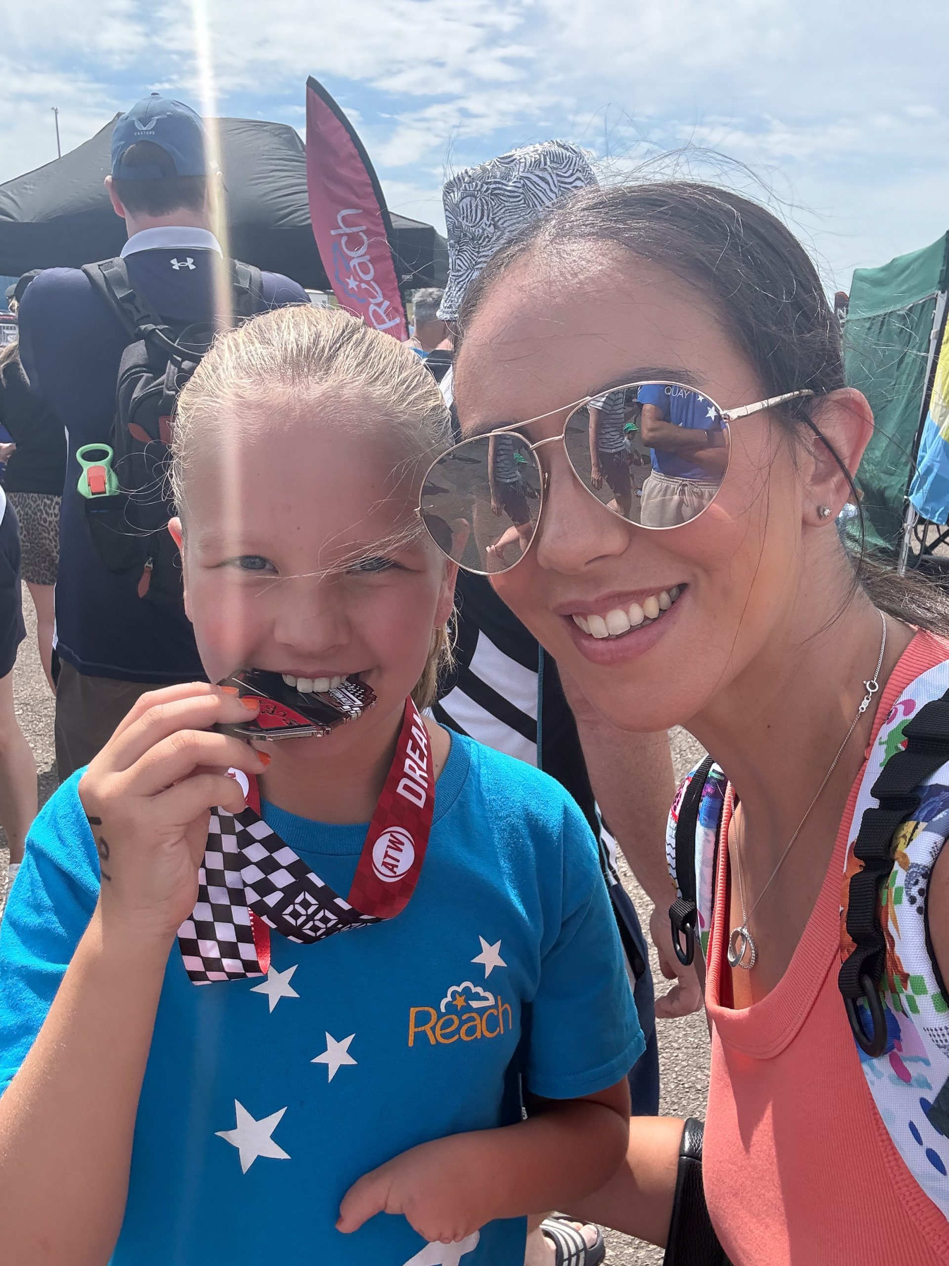 Crossing the finish line together | Reach Triathlon 2026